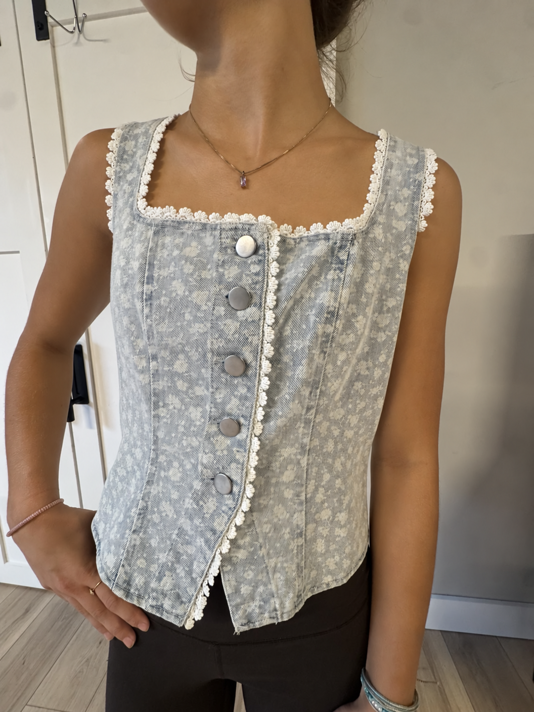 ￼ Faded floral denim vest ￼